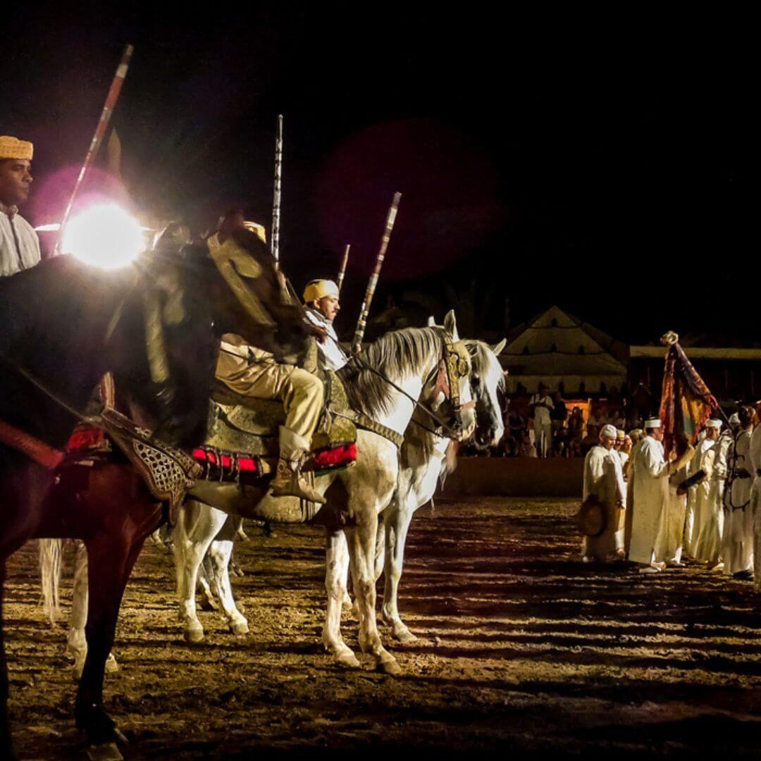 Colorful folklore show at Fantasia Chez Ali in Marrakech